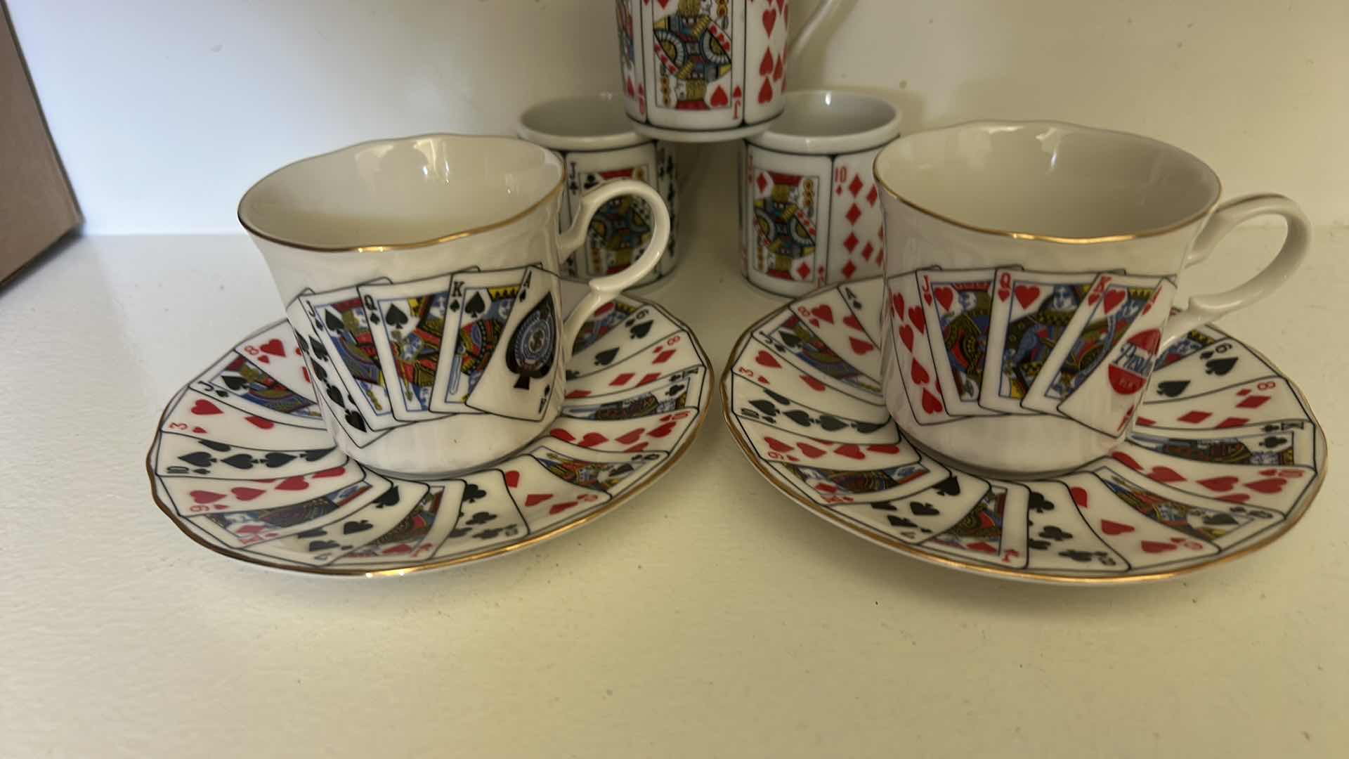 Photo 1 of 2 EA  DEMITASSE CUPS AND SAUCERS, PLAYING CARD PATTERN . & 3 MORE CUPS