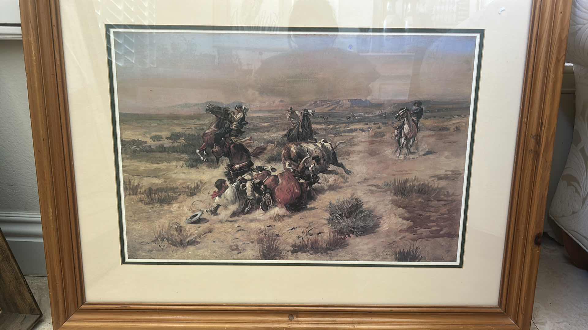 Photo 1 of FRAMED PRINT OF “THE STRENUOUS LIFE” BY CHARLES MARION RUSSELL 
35” x  H27 1/2” DAMAGE SHOWN