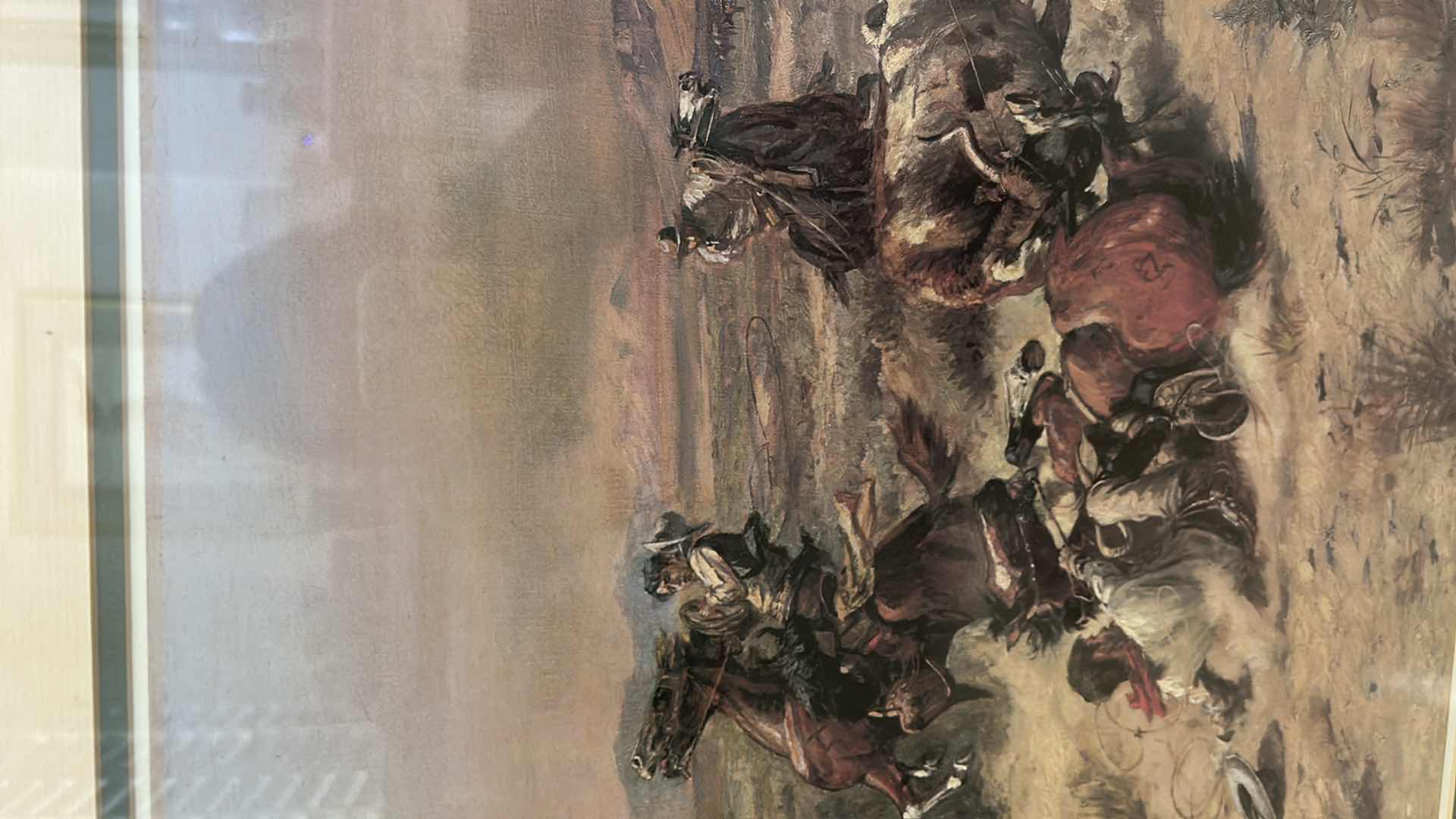 Photo 1 of FRAMED PRINT OF “THE STRENUOUS LIFE” BY CHARLES MARION RUSSELL 
35” x  H27 1/2” DAMAGE SHOWN