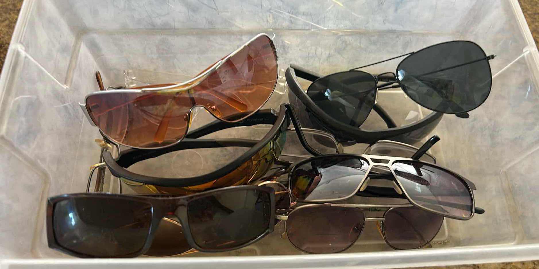 Photo 1 of CONTENTS OF CONTAINER ASSORTED SUN GLASSES AND EYEWEAR