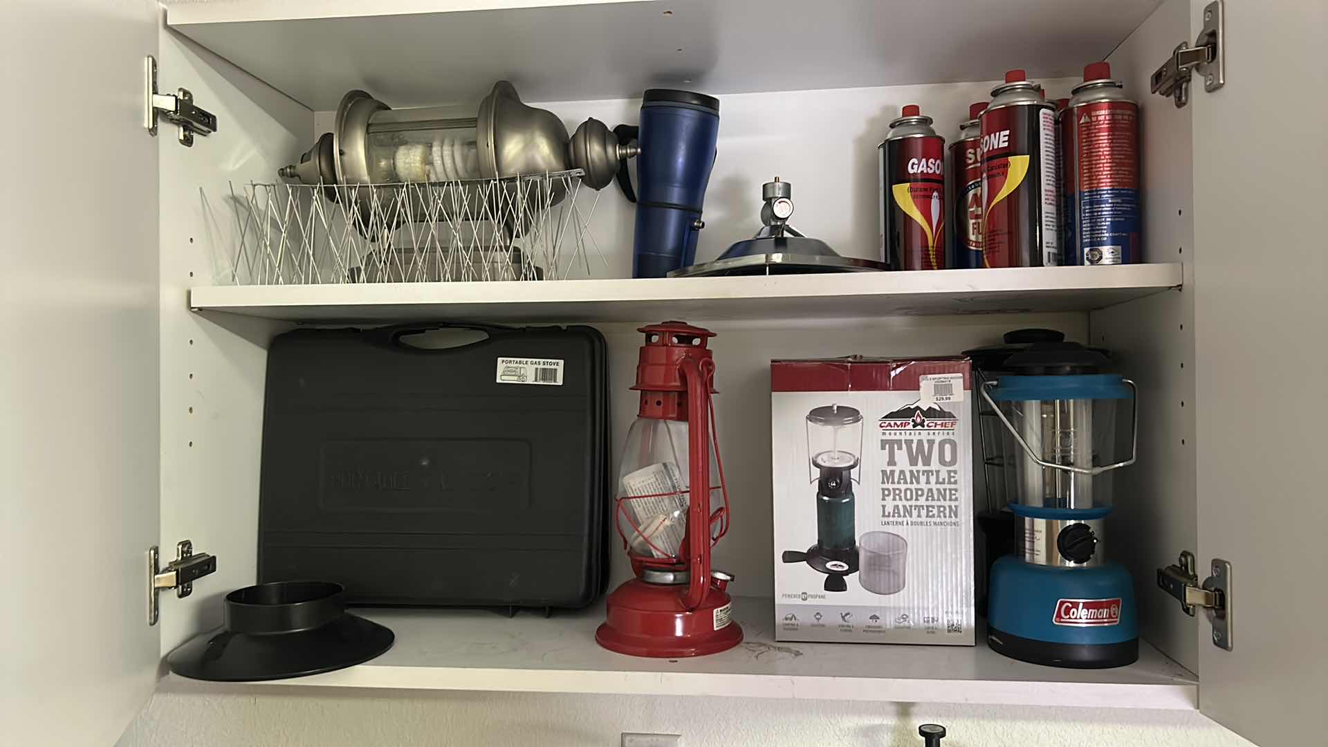 Photo 1 of CONTENTS OF CABINET IN GARAGE