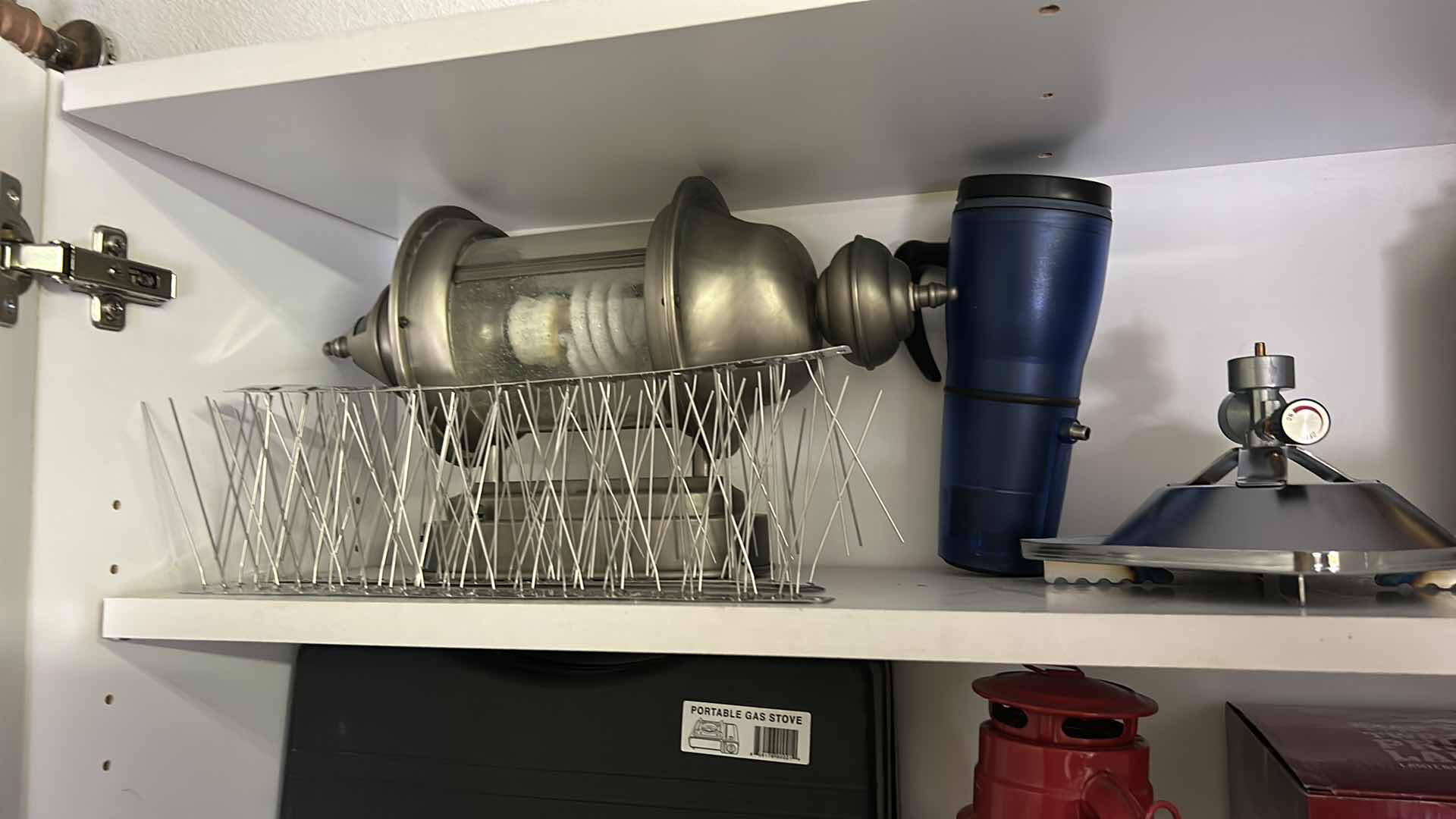 Photo 1 of CONTENTS OF CABINET IN GARAGE