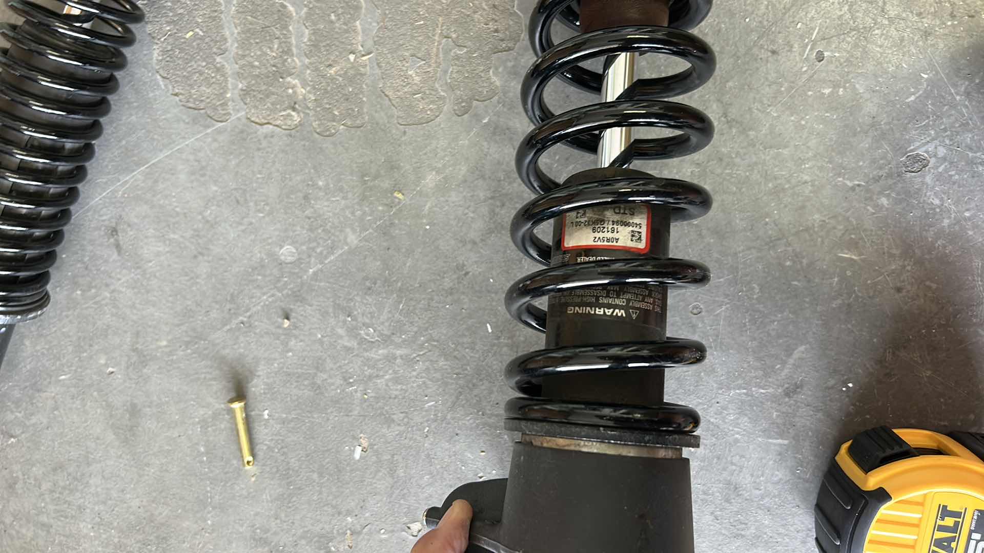 Photo 1 of 2 MOTORCYCLE REAR SHOCKS LIKELY HARLEY DAVIDSON GIVEN THE TEXT,  "GPRELO OSPRING STMENT"