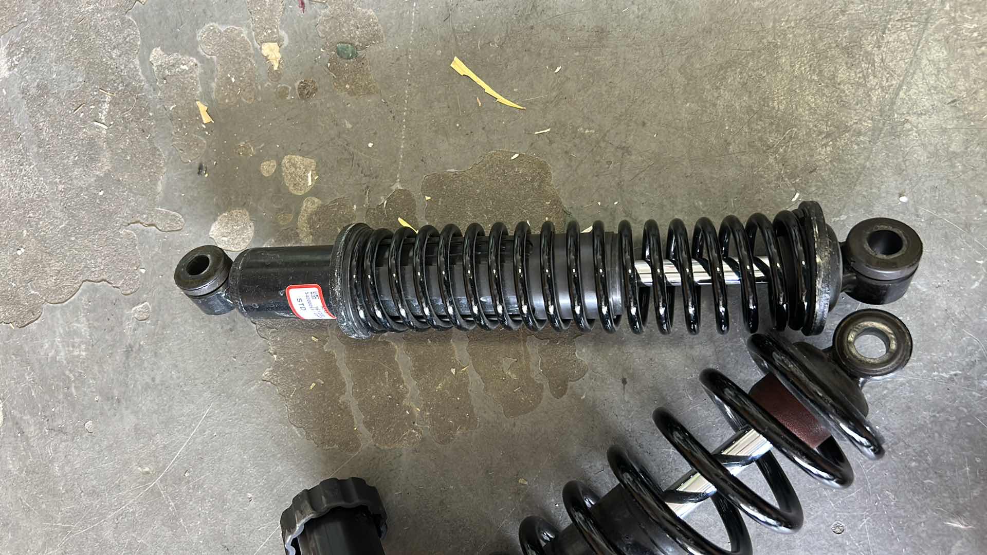 Photo 1 of 2 MOTORCYCLE REAR SHOCKS LIKELY HARLEY DAVIDSON GIVEN THE TEXT,  "GPRELO OSPRING STMENT"