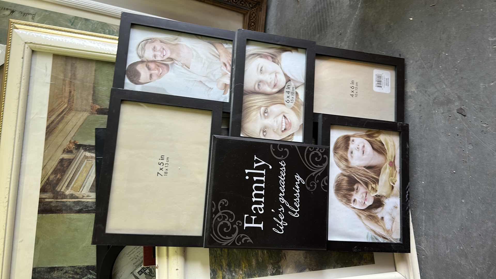 Photo 1 of STACK OF ARTWORK AND FRAMES ( LARGEST 27 x H37.5”)