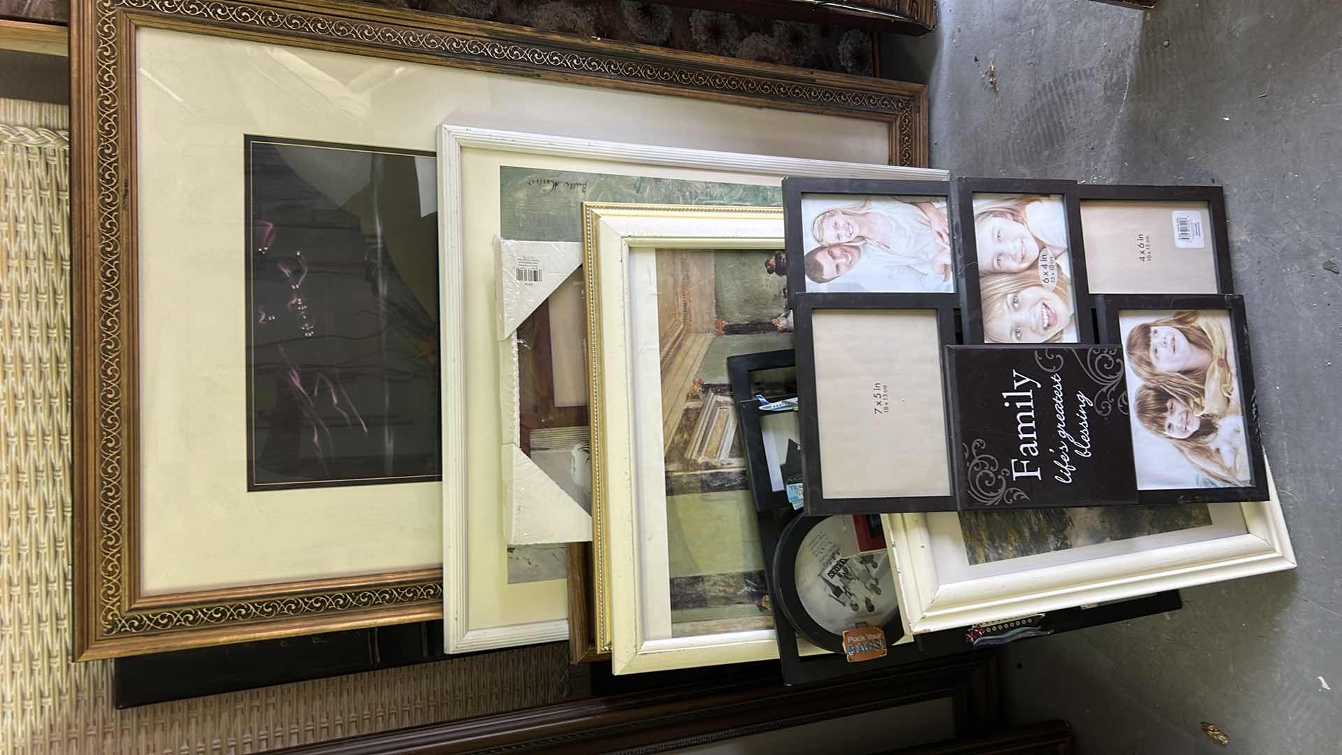 Photo 1 of STACK OF ARTWORK AND FRAMES ( LARGEST 27 x H37.5”)