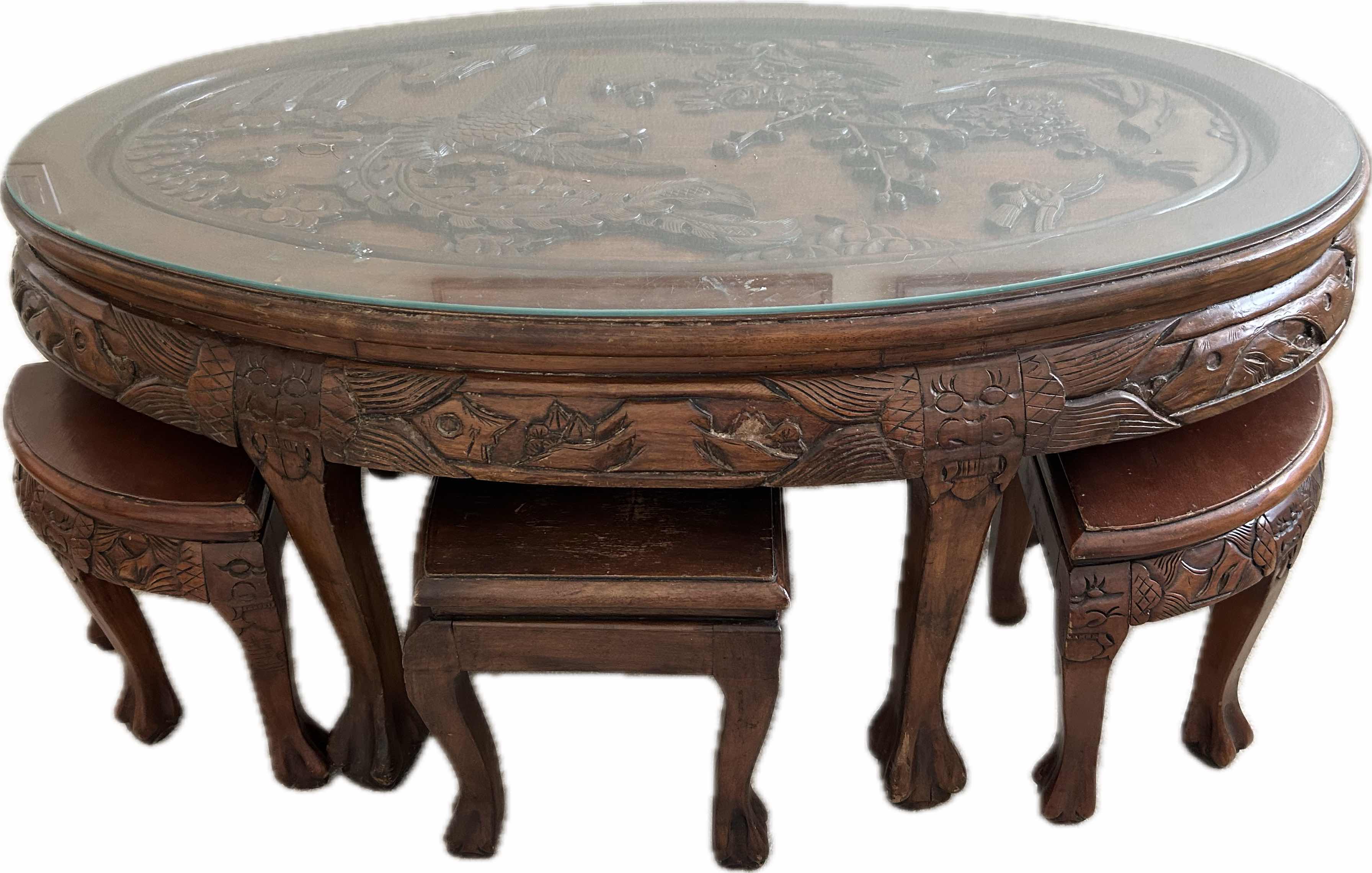 Photo 1 of ROSEWOOD CHINESE CARVED TEA TABLE W NESTING STOOLS AND GLASS TOP 47" X 29" H 22" 