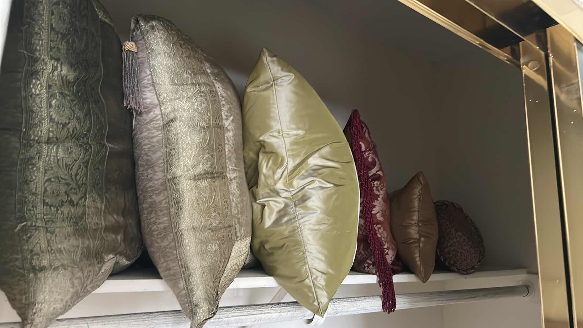 Photo 1 of CONTENTS OF CLOSET ASSORTED DECORATIVE PILLOWS