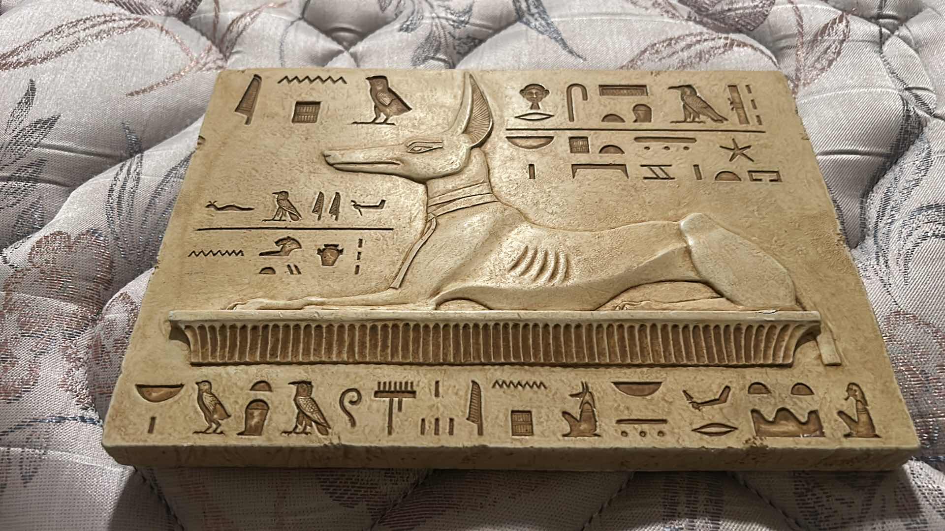 Photo 1 of PLASTER WALL SCULPTURE OF ANUBIS, THE EGYPTIAN GOD ASSOCIATED WITH MUMMIFICATION AND AFTERLIFE . 103/4” x H7.25”