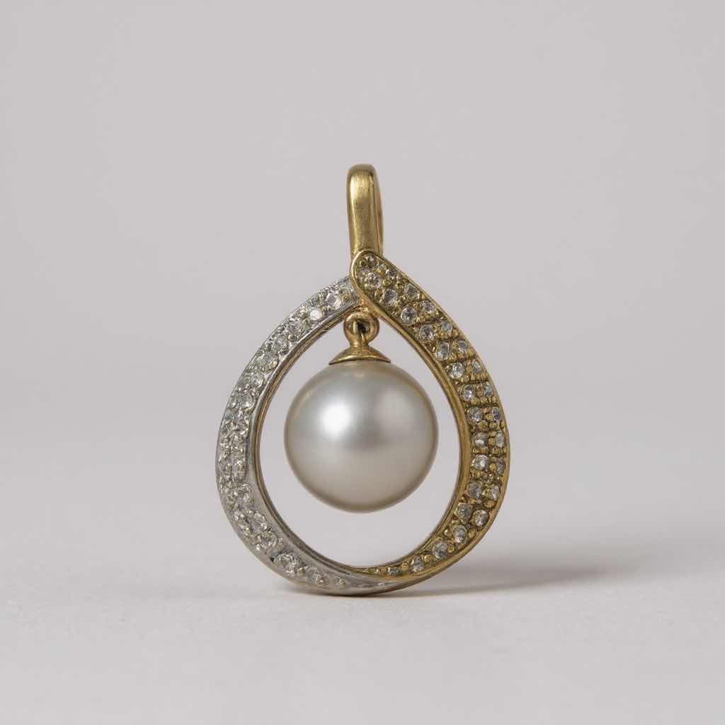 Photo 1 of 18K TWO TONE PEARL/W .50 ctw DIAMOND PENDANT TTL GRAMS 7.49 W INSURANCE APPRAISAL ITEM # 2016 