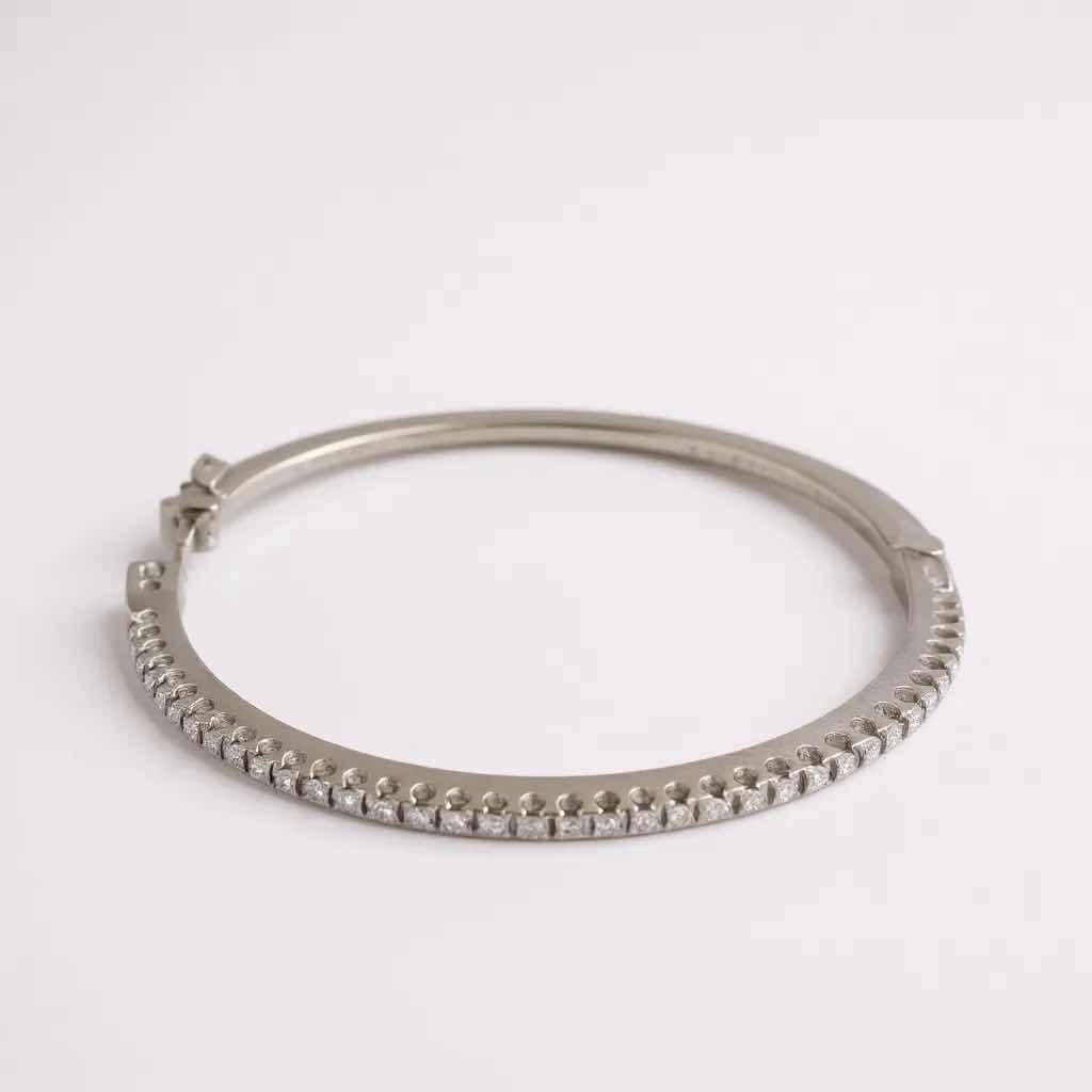 Photo 1 of 18K WHITE GOLD W 0.50 ctw DIAMOND BANGLE BRACELET TTL GRAMS 14.35 W INSURANCE APPRAISAL ITEM # 2015 