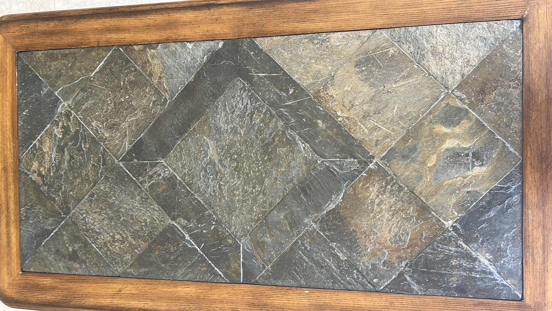 Photo 1 of SOLID WOOD MAGNUSSEN MADISON RECTANGULAR LIFT-TOP COCKTAIL TABLE  W A SLATE INLAY TOP ON CASTERS 48" X 27" H 19" 