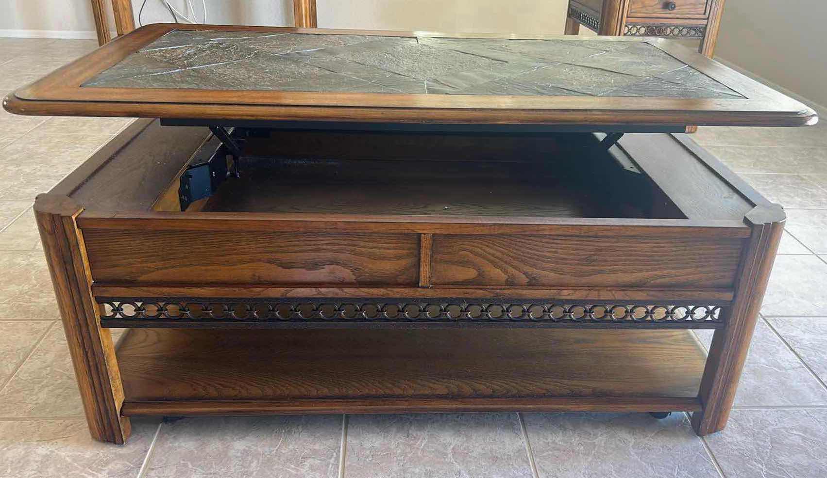 Photo 1 of SOLID WOOD MAGNUSSEN MADISON RECTANGULAR LIFT-TOP COCKTAIL TABLE  W A SLATE INLAY TOP ON CASTERS 48" X 27" H 19" 