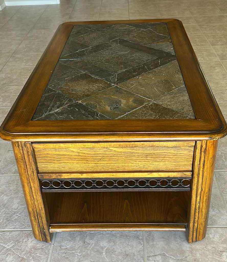 Photo 1 of SOLID WOOD MAGNUSSEN MADISON RECTANGULAR LIFT-TOP COCKTAIL TABLE  W A SLATE INLAY TOP ON CASTERS 48" X 27" H 19" 