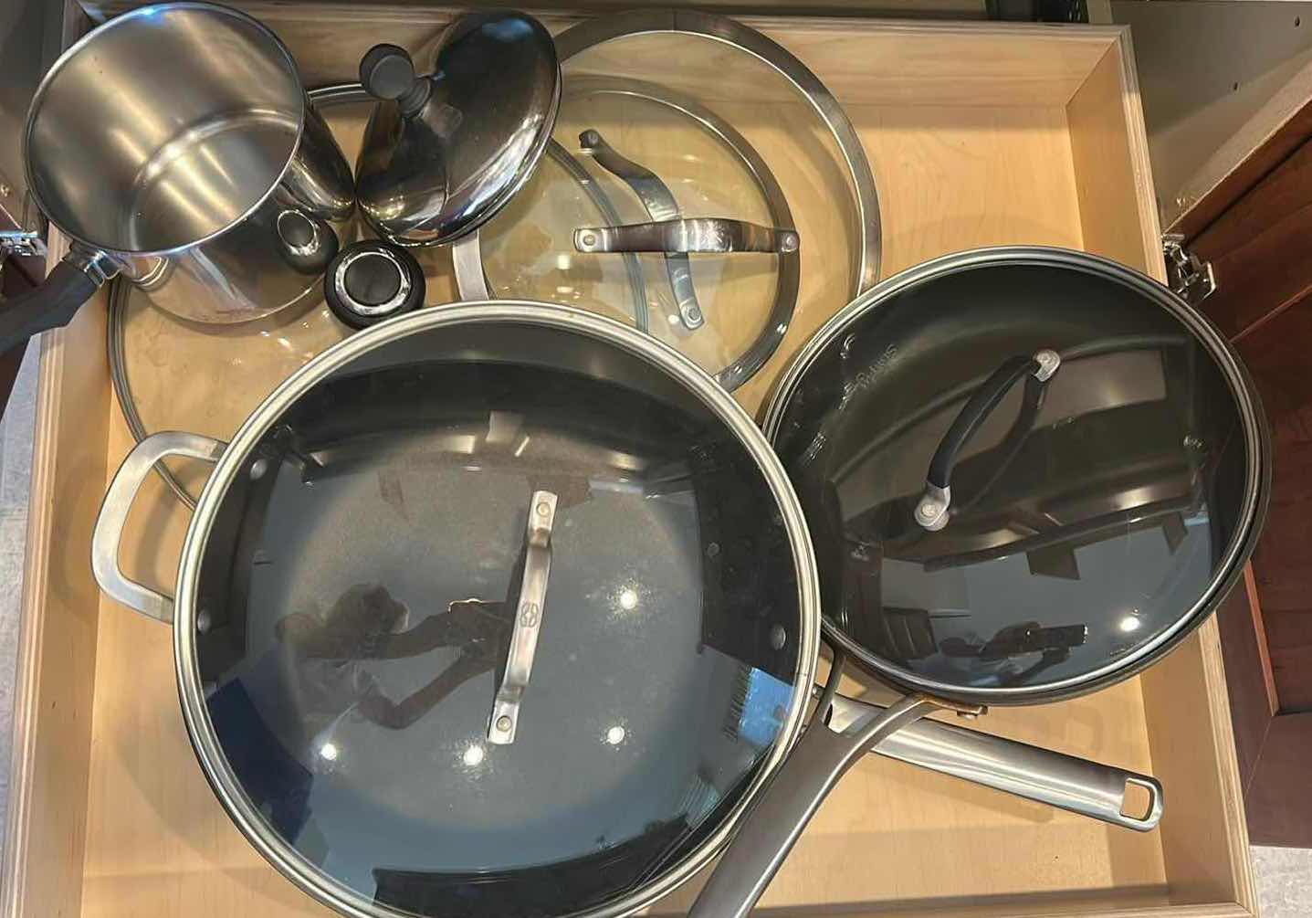 Photo 1 of CONTENTS OF CABINET POTS AND PANS