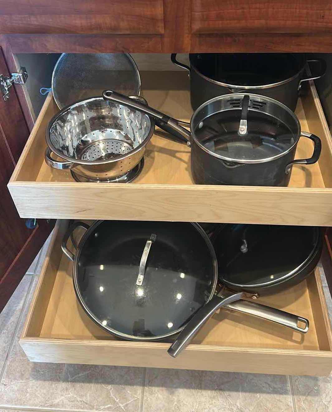 Photo 1 of CONTENTS OF CABINET POTS AND PANS