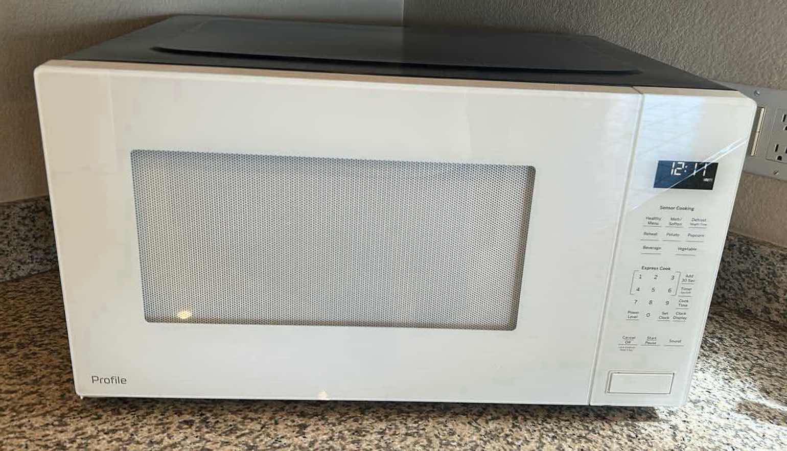 Photo 1 of PROFILE MICROWAVE OVEN  24" X 18"