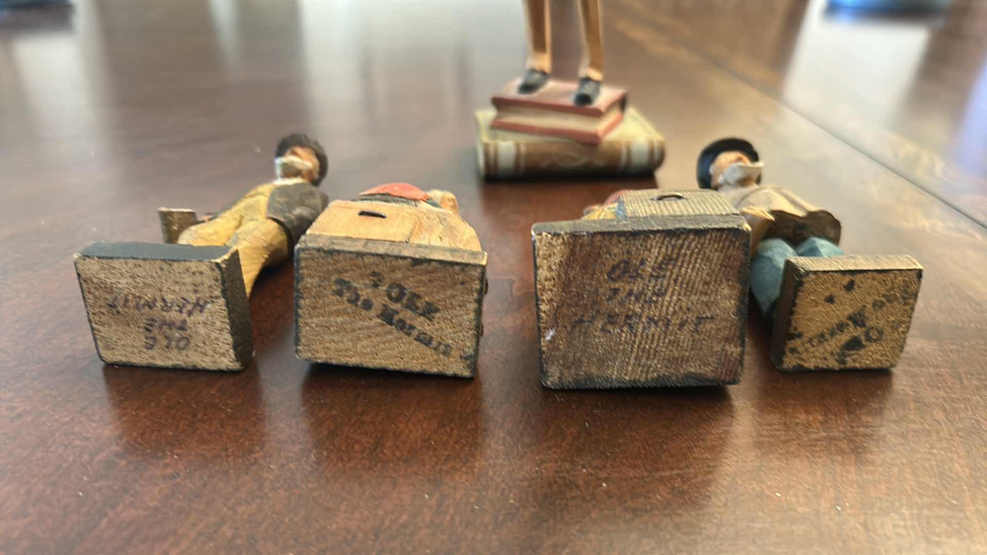 Photo 1 of COLLECTION OF HAND CARVED WOODEN FOLK ART "OLE THE HERMIT"