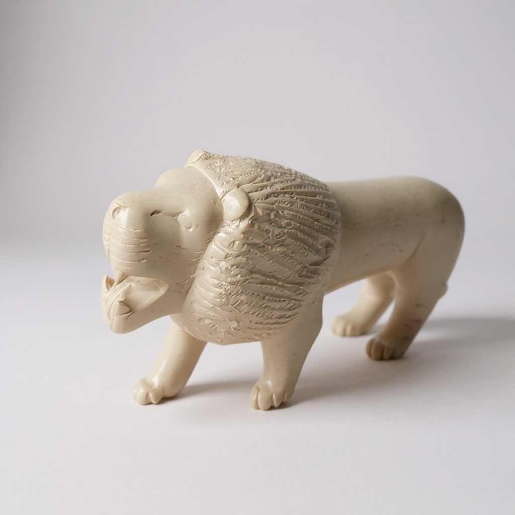 Photo 1 of HAND CARVED SOAP STONE LION FROM AFRICA W 10"