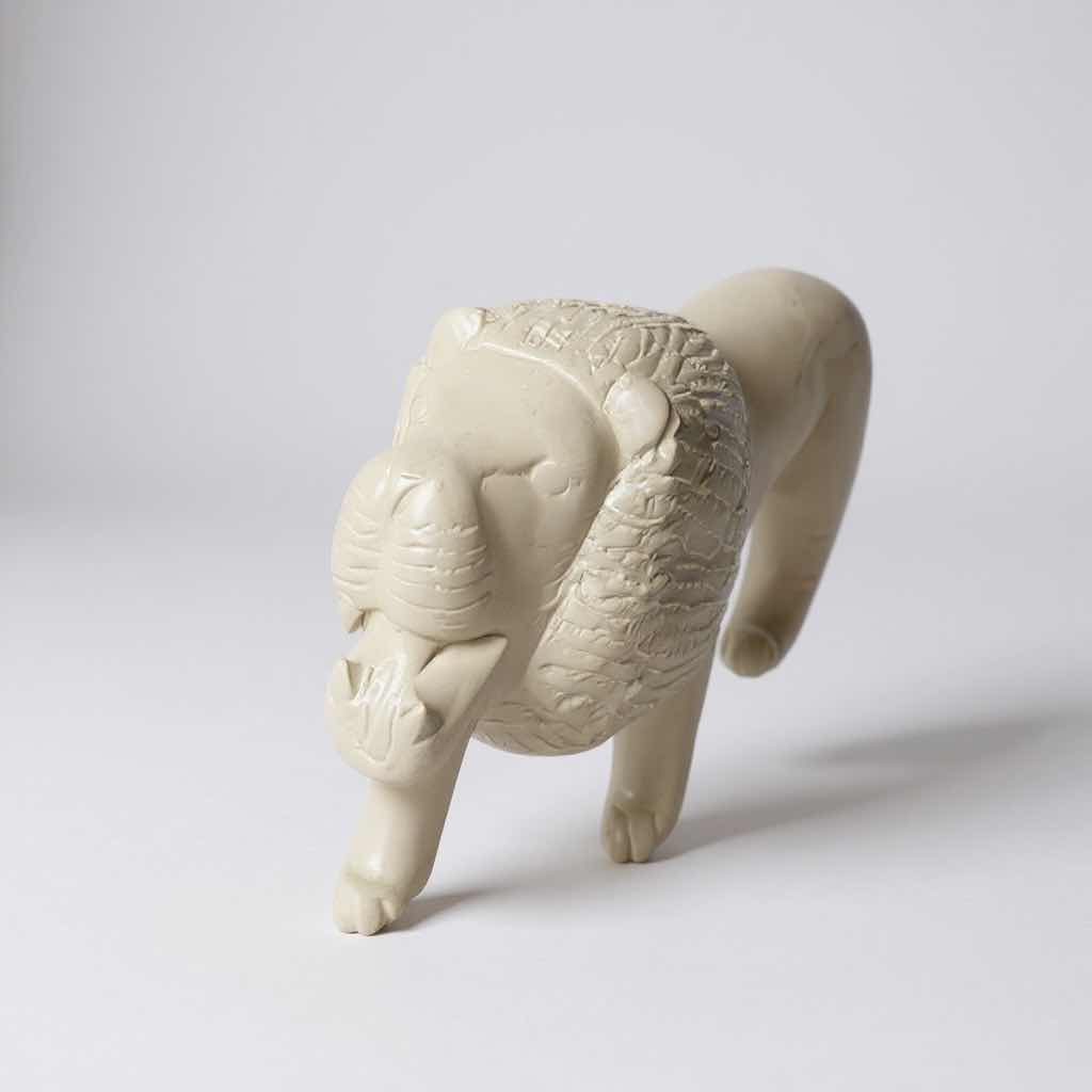 Photo 1 of HAND CARVED SOAP STONE LION FROM AFRICA W 10"