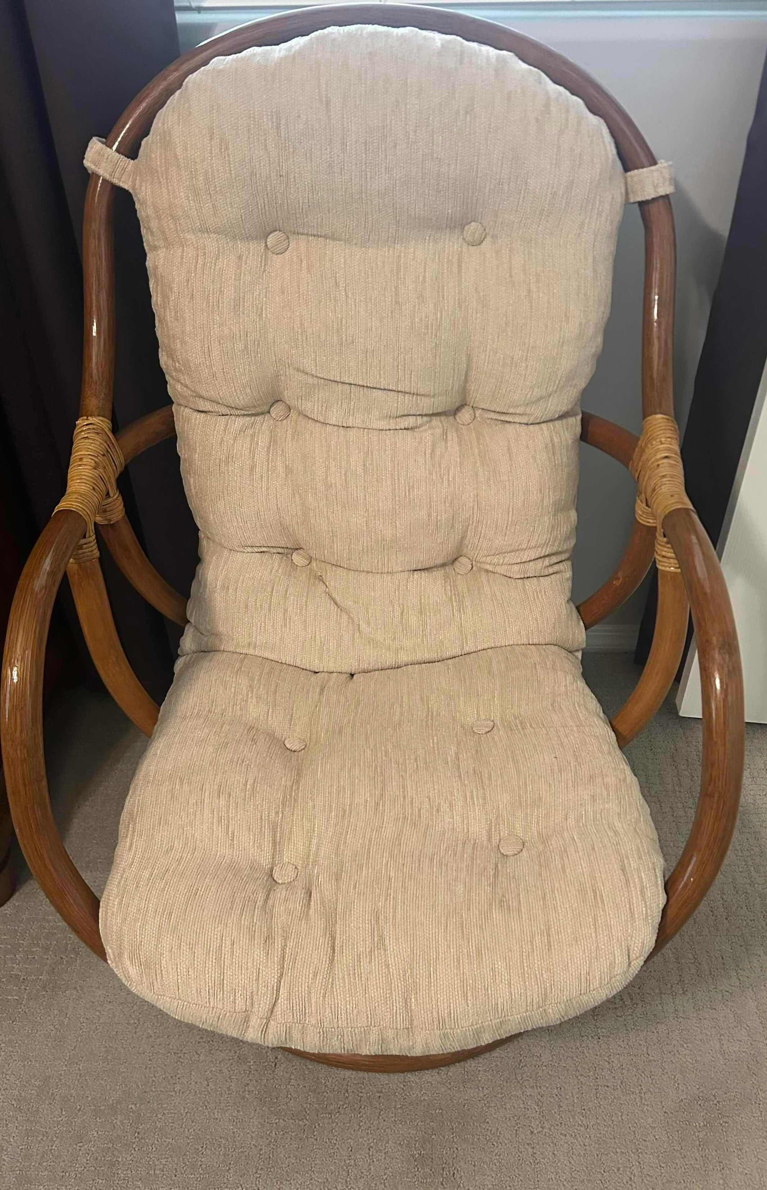 Photo 1 of RATTAN SWIVEL ROCKING CHAIR W TUFTED CUSHION 