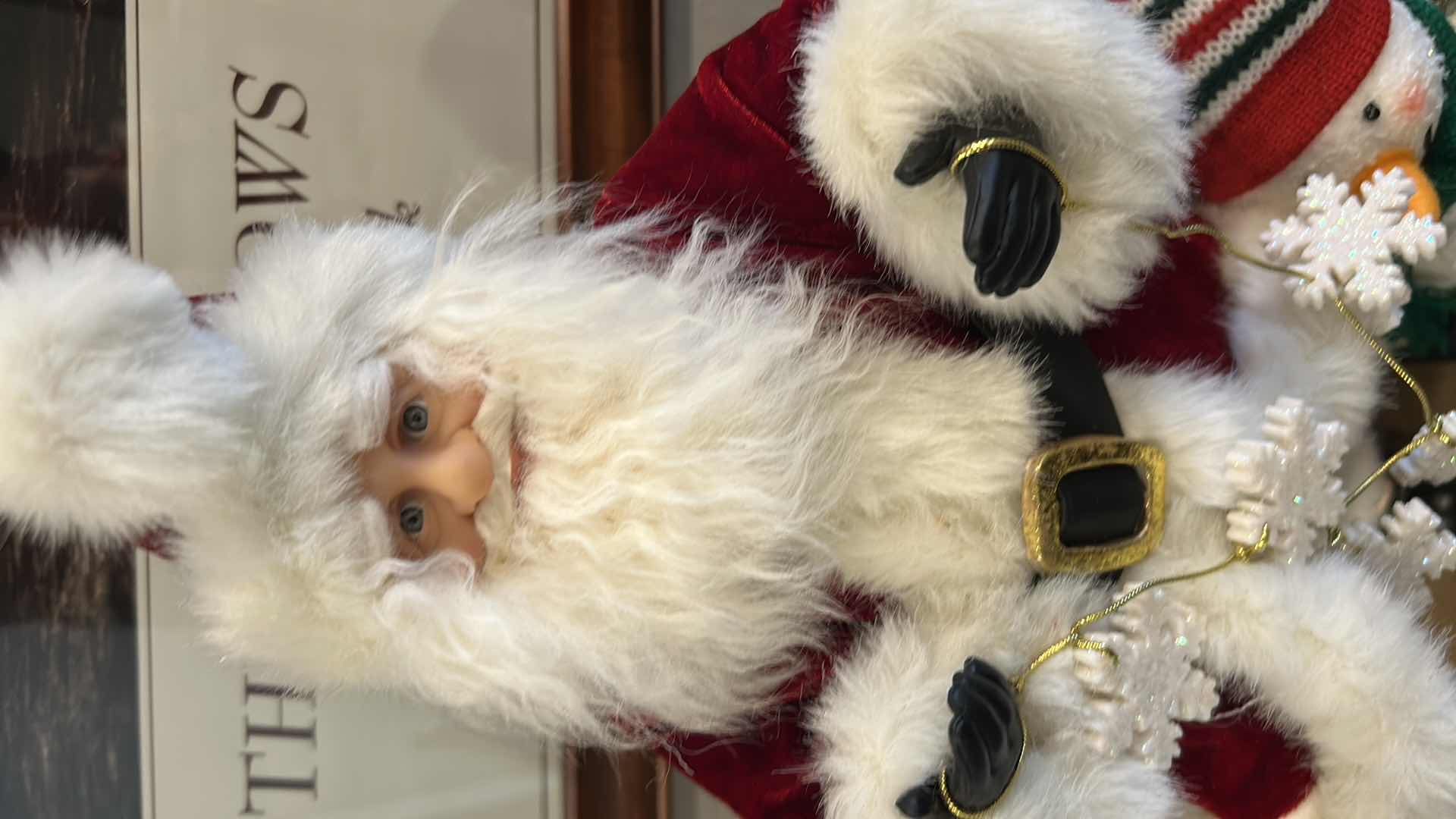 Photo 1 of COLLECTABLE SANTA FIGURINE W SNOWMAN HOLDING SNOWFLAKES H 18"
