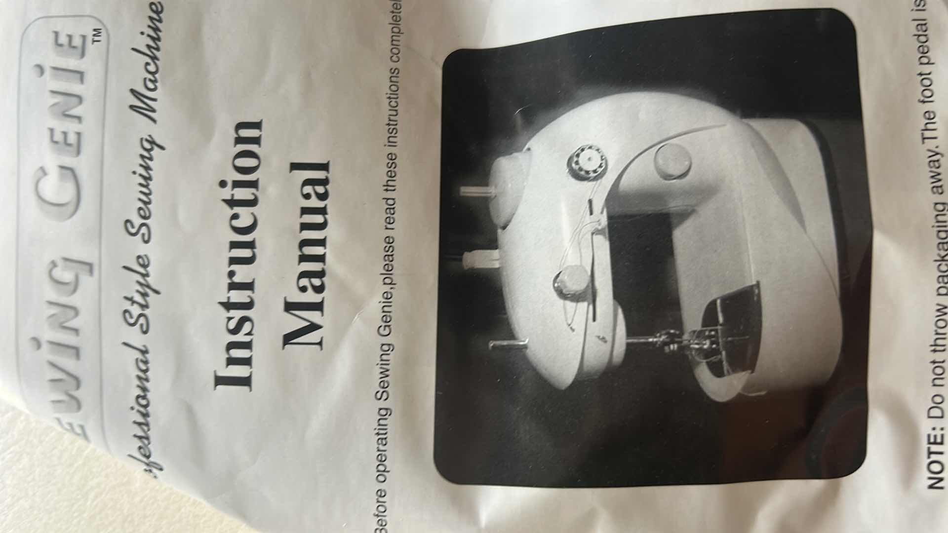 Photo 1 of SEWING GENIE MINI SEWING MACHINE