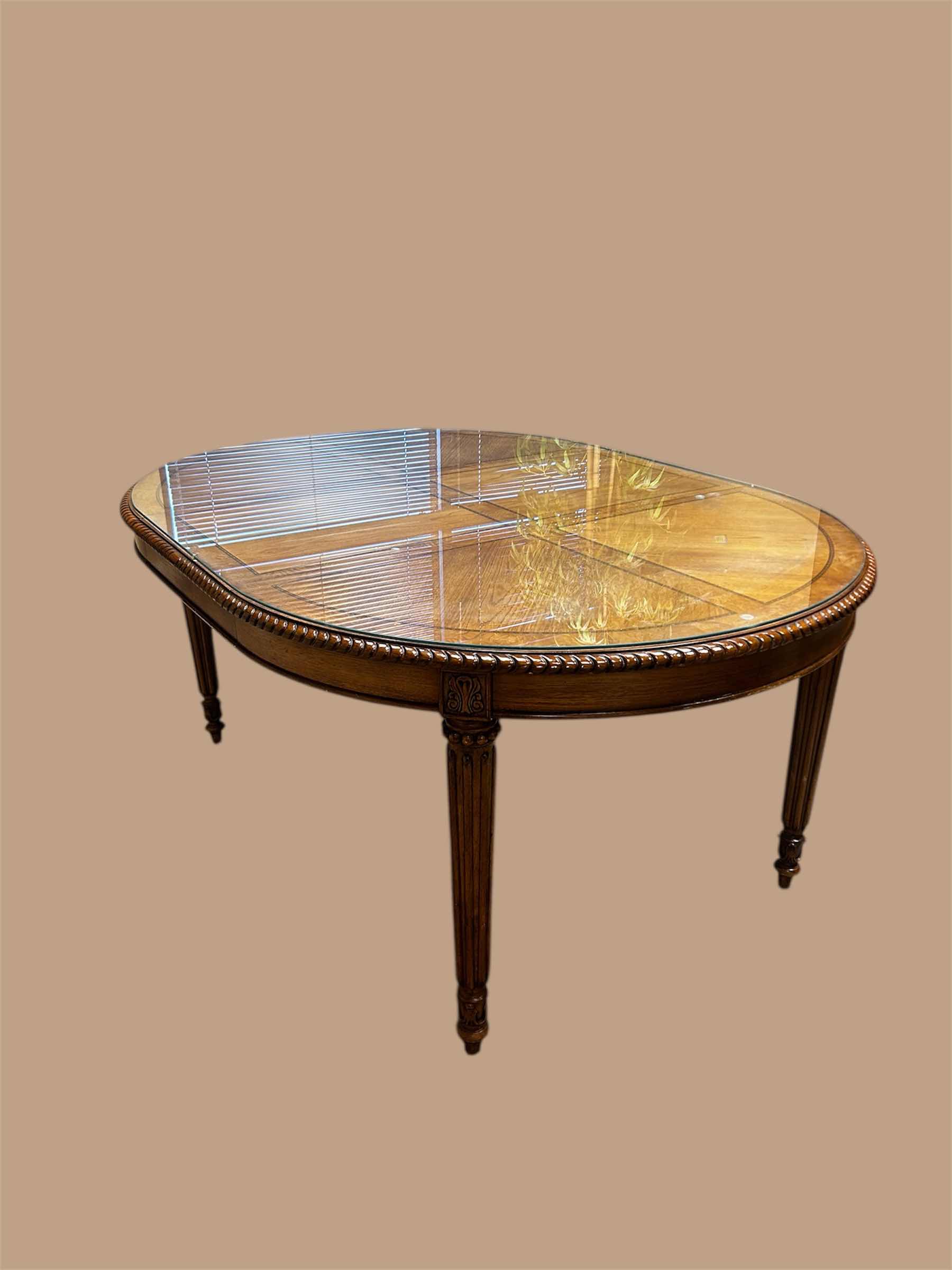 Photo 1 of LOUIS XVI STYLE OVAL DINING TABLE CARVED APRON W GLASS TOP AND LEAF 67" X 48" H 30"