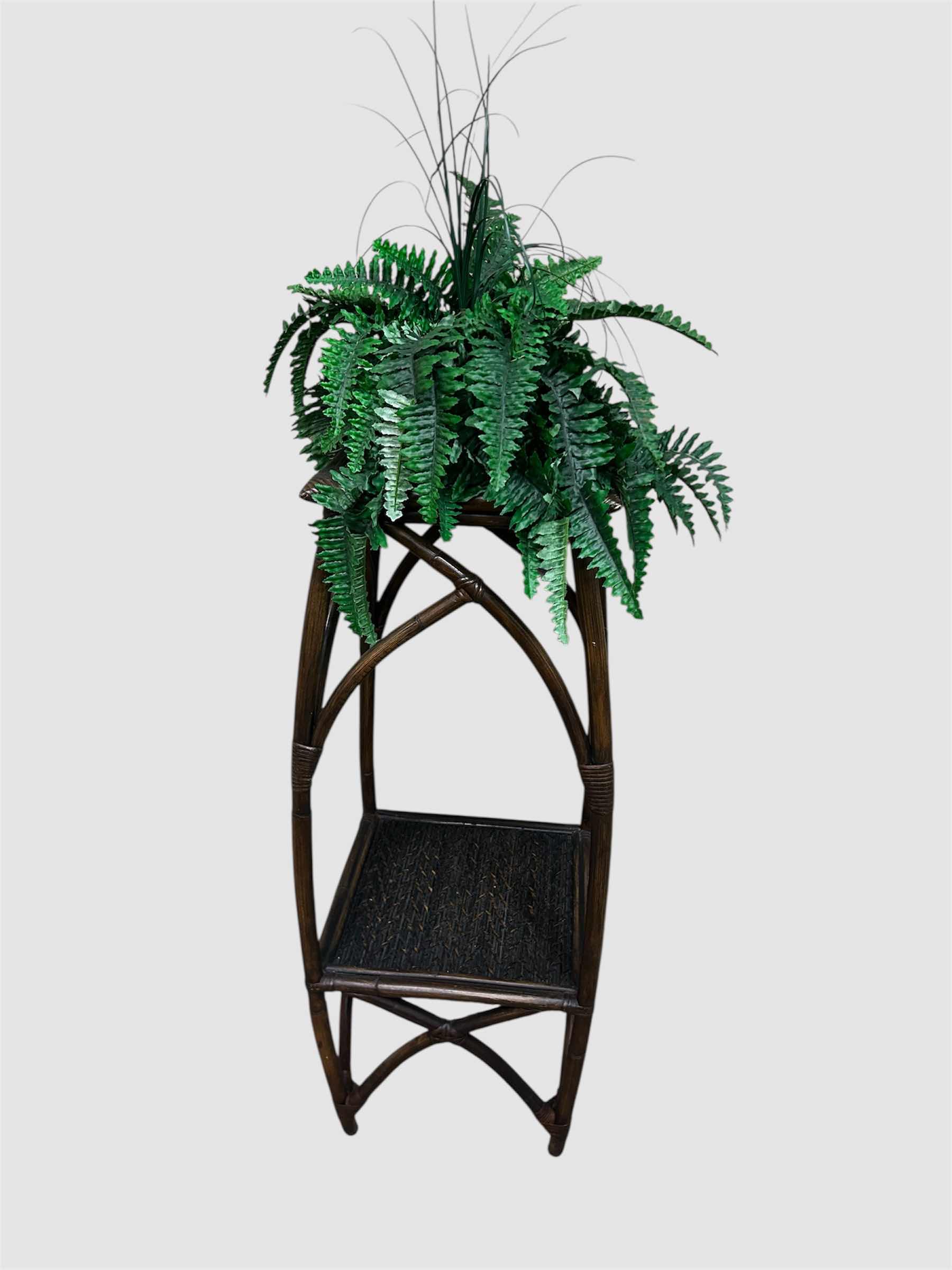 Photo 1 of ARTIFICIAL BOSTON FERN W RATTAN LOWER SHELF AND X SHAPED  BASE
H 51"