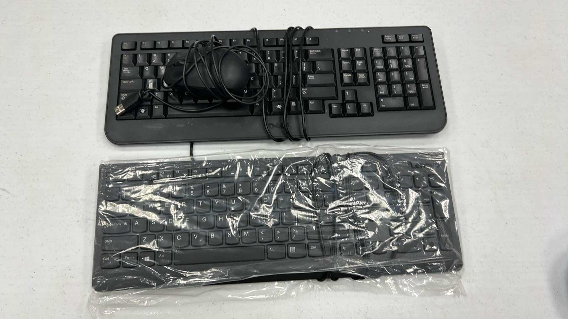Photo 1 of 2- KEY BOARDS W MOUSE