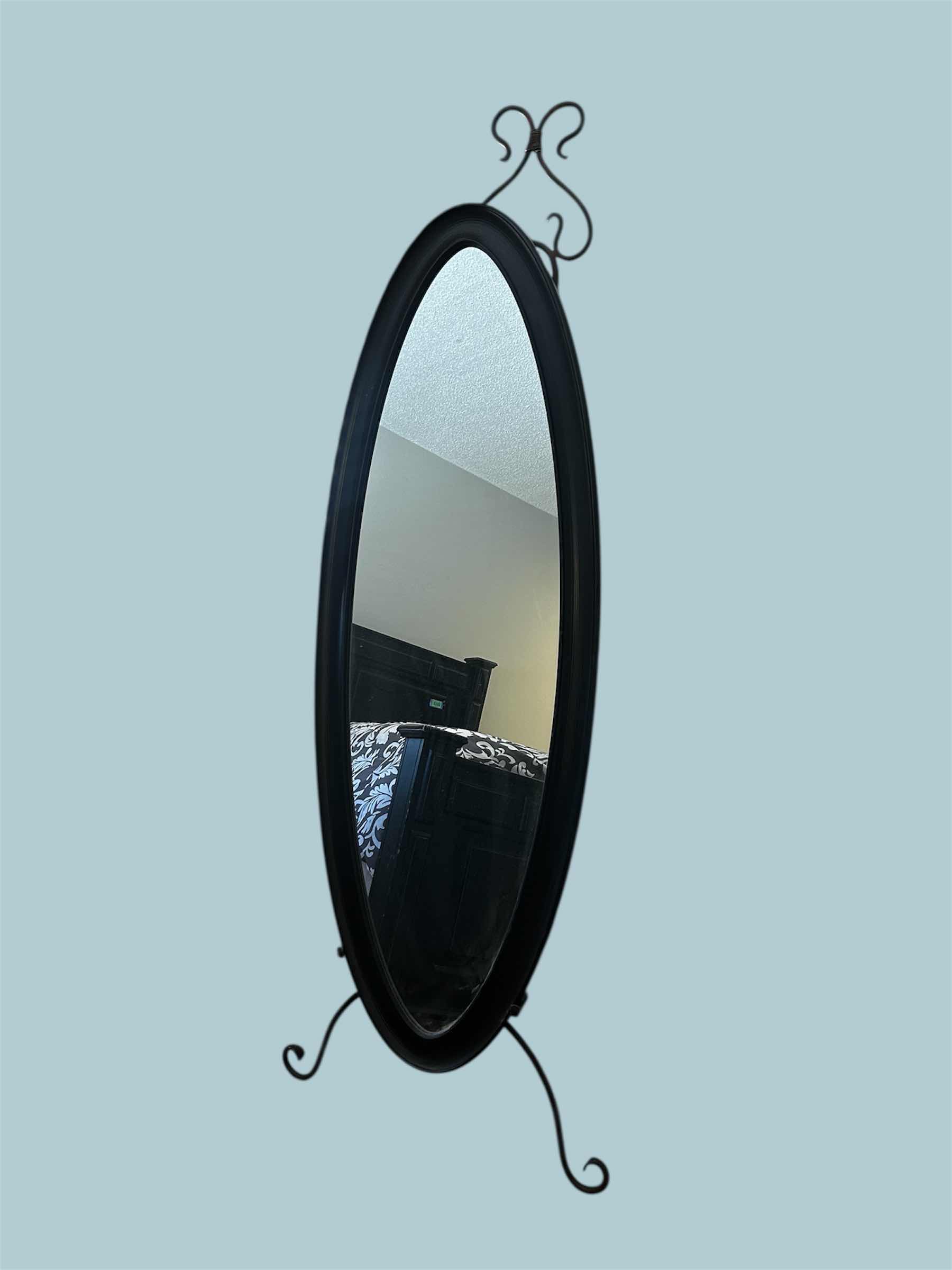 Photo 1 of BLACK OVAL SHAPED CHEVAL FLOOR MIRROR W SCROLL DESIGN STAND 55" X 20"