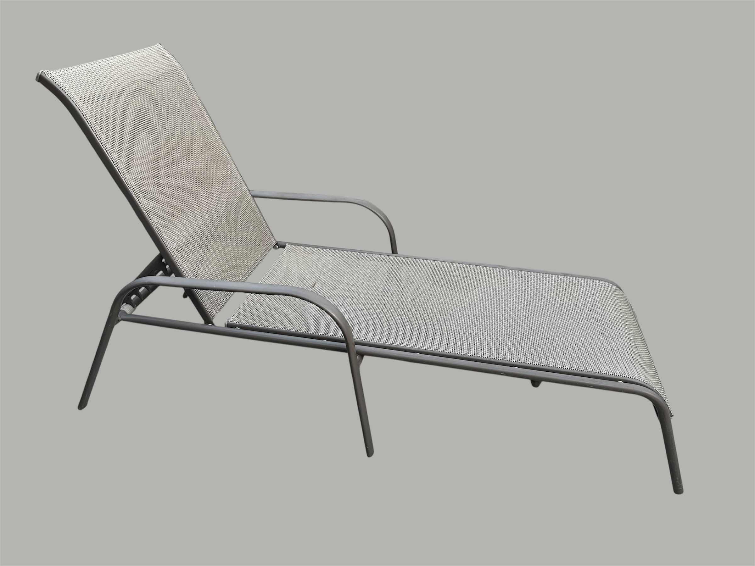 Photo 1 of TAN METAL FRAME STATIONARY CHAISE LOUNGE CHAIR W TAN SLING