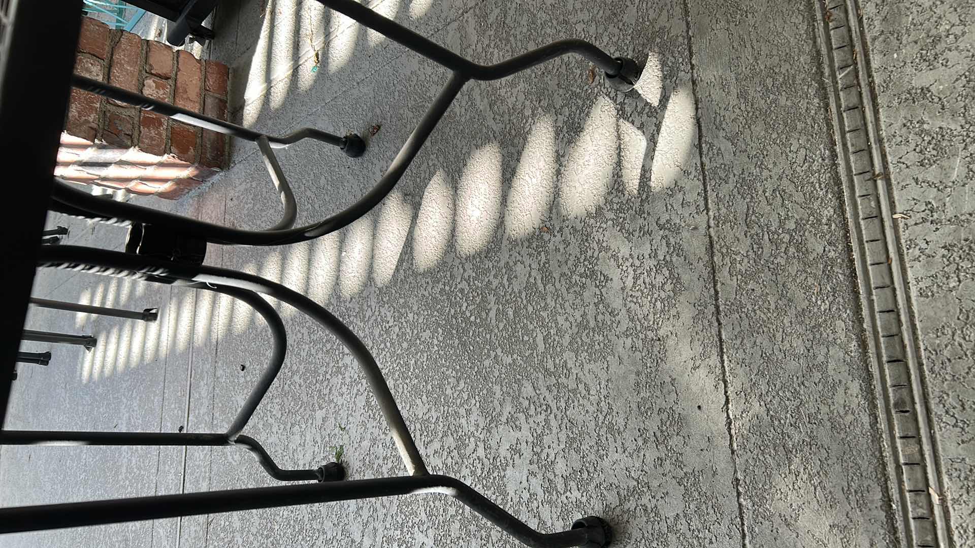 Photo 1 of ROUND BLACK METAL MESH OUTDOOR PATIO TABLE W UMBRELLA HOLE 42"