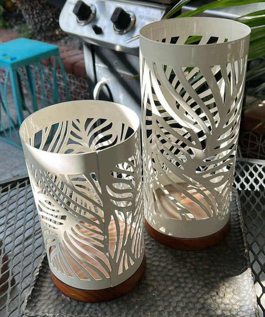 Photo 1 of 2-HAWAIIAN METAL CANDLE HOLDER H 8" 6"