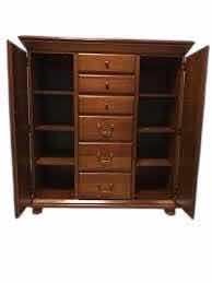 Photo 1 of NORMAN ROCKWELL COLLECTION ARMOIRE FROM STANLEY FURNITURE 
48" X 19" H 53"