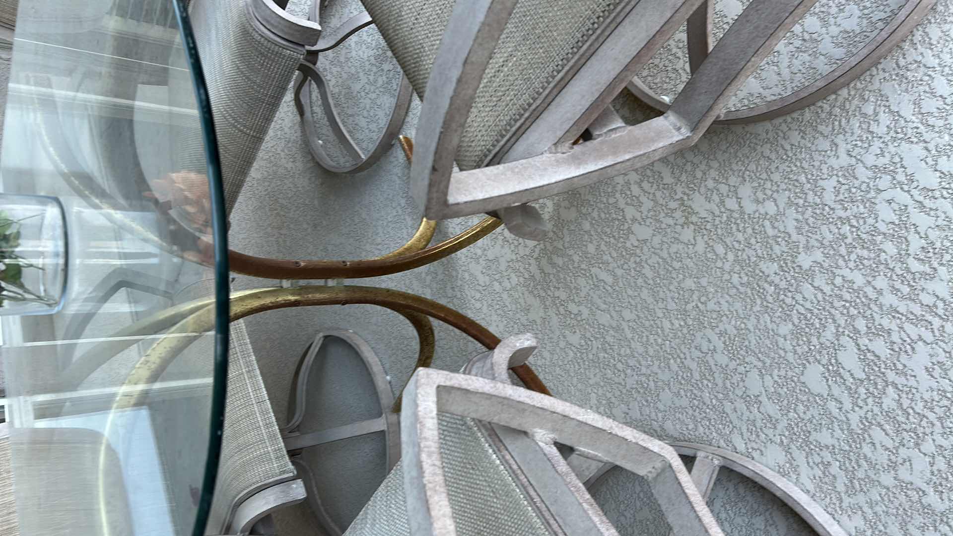 Photo 1 of GLASS TABLE W 4 SLING SWIVEL CHAIRS