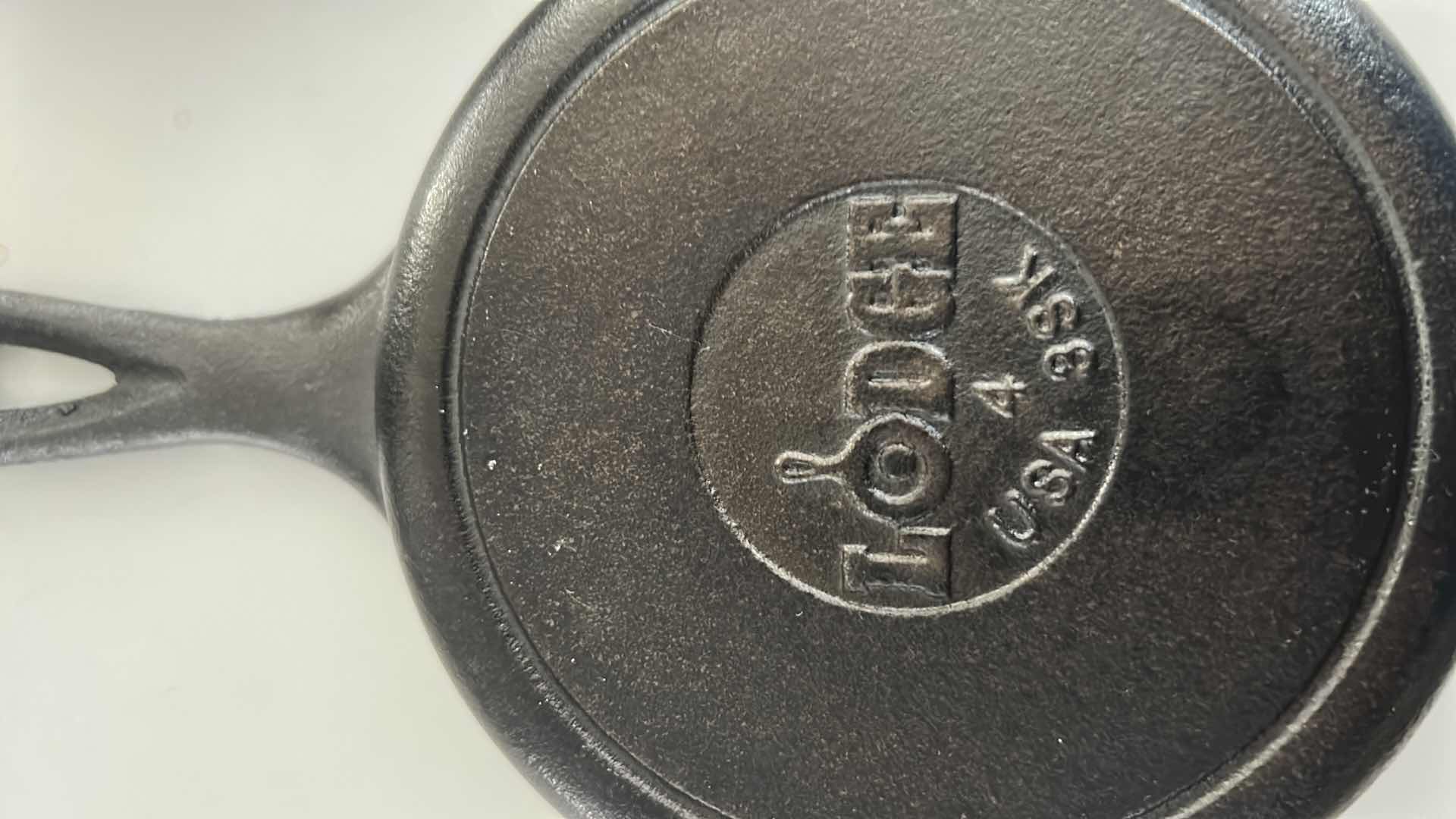 Photo 1 of 4-LODGE PRE SEASONED CAST IRON MINI SKILLETS