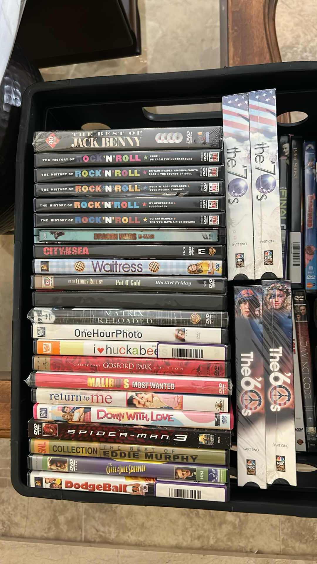 Photo 1 of CONTENTS OF PLASTIC BIN ASSORTMENT OF DVD'S