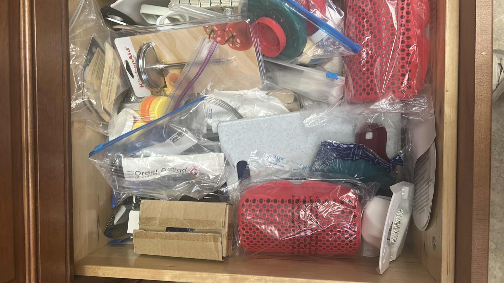 Photo 1 of CONTENTS OF 2 DRAWERS KITCHEN SUPPLIES