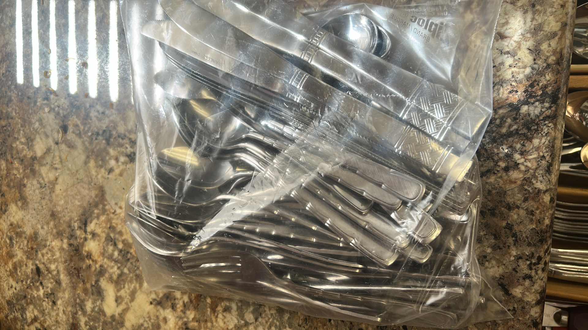 Photo 1 of CONTENTS OF DRAWER SILVERWARE BAG OF SILVERWARE