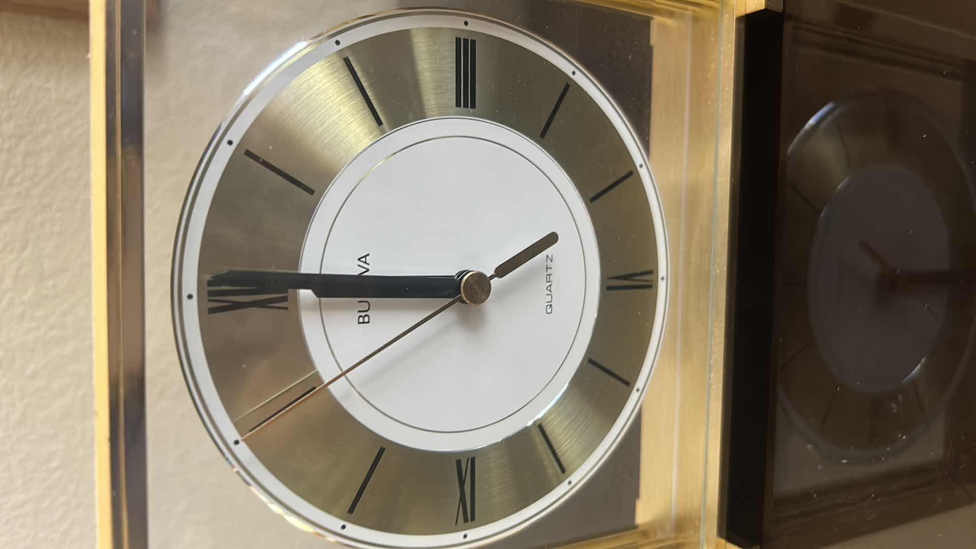 Photo 1 of BULOVA GRAND PRIX ANALOG QUARTZ MANTEL CLOCK W BRASS FINISHED METAL 7" X 7"