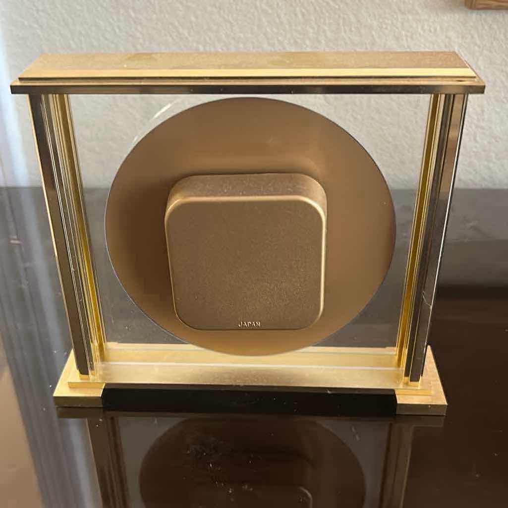 Photo 1 of BULOVA GRAND PRIX ANALOG QUARTZ MANTEL CLOCK W BRASS FINISHED METAL 7" X 7"