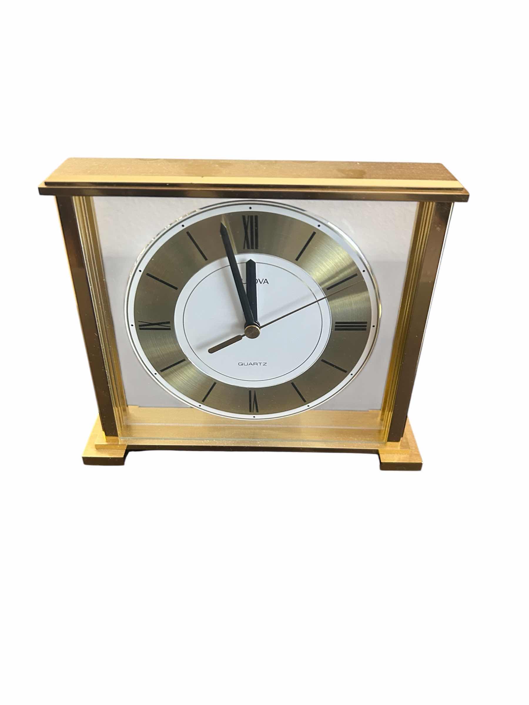Photo 1 of BULOVA GRAND PRIX ANALOG QUARTZ MANTEL CLOCK W BRASS FINISHED METAL 7" X 7"