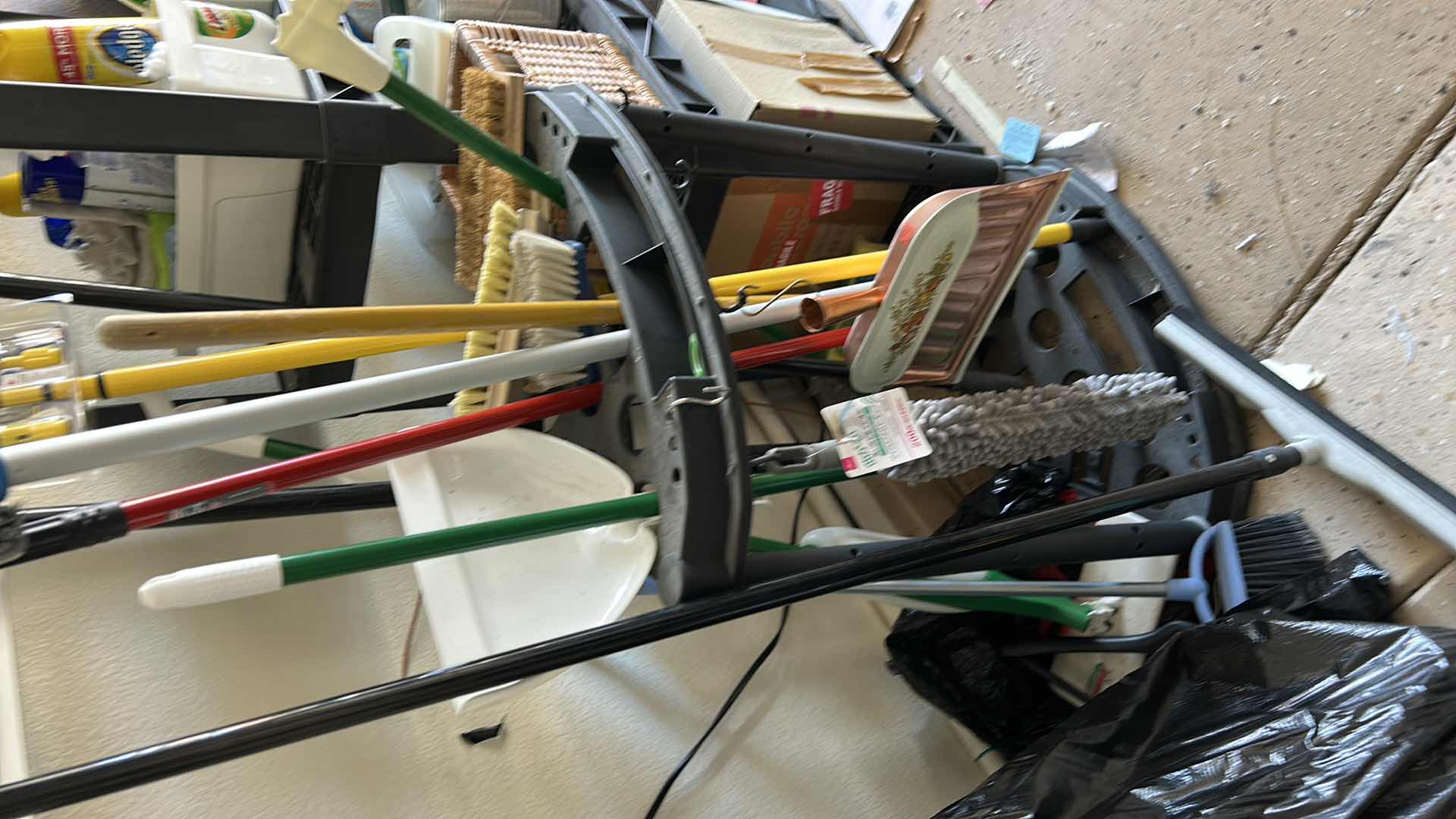 Photo 1 of CLEANING SUPPLIES AND CART