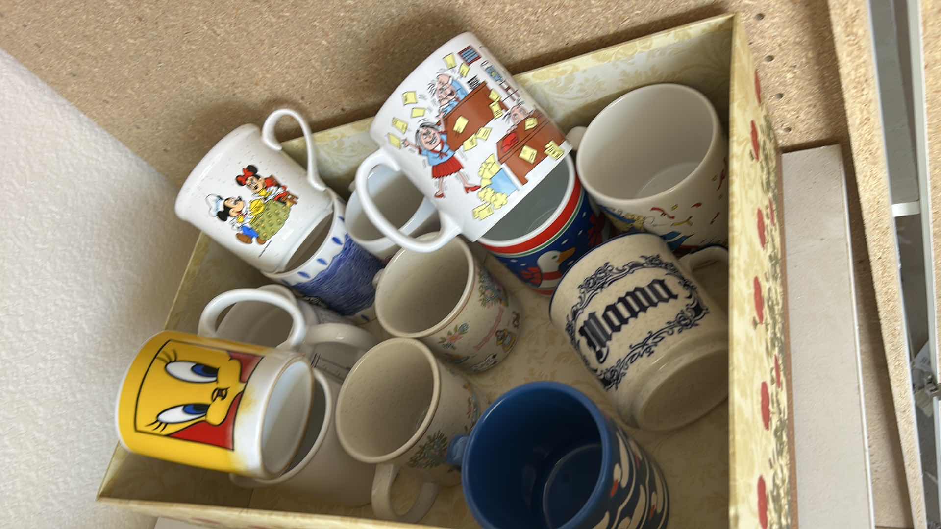Photo 1 of CONTENTS ON 2 SHELVES- GAMES, HOUSEHOLD GOODS, COFFEE MUGS, BOWLS AND MORE
