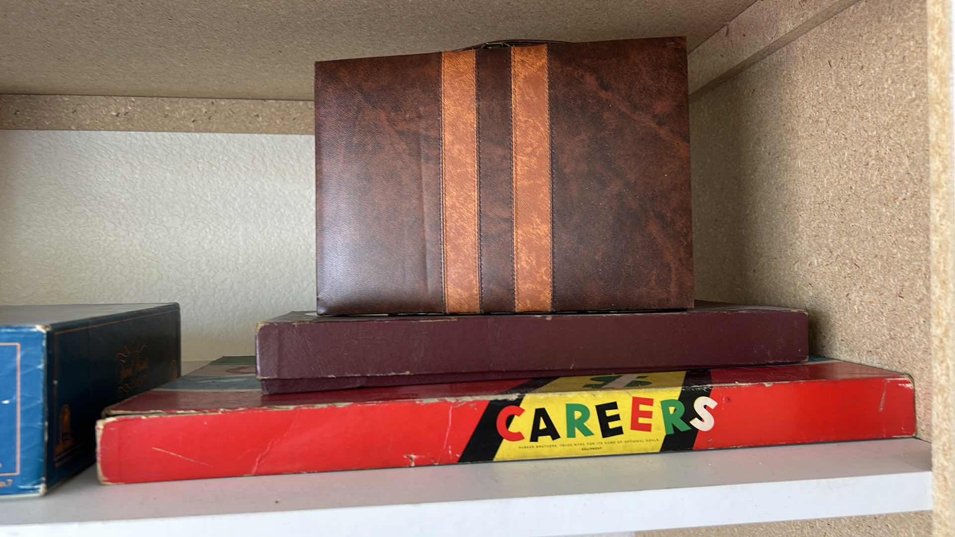 Photo 1 of CONTENTS ON 2 SHELVES- GAMES, HOUSEHOLD GOODS, COFFEE MUGS, BOWLS AND MORE