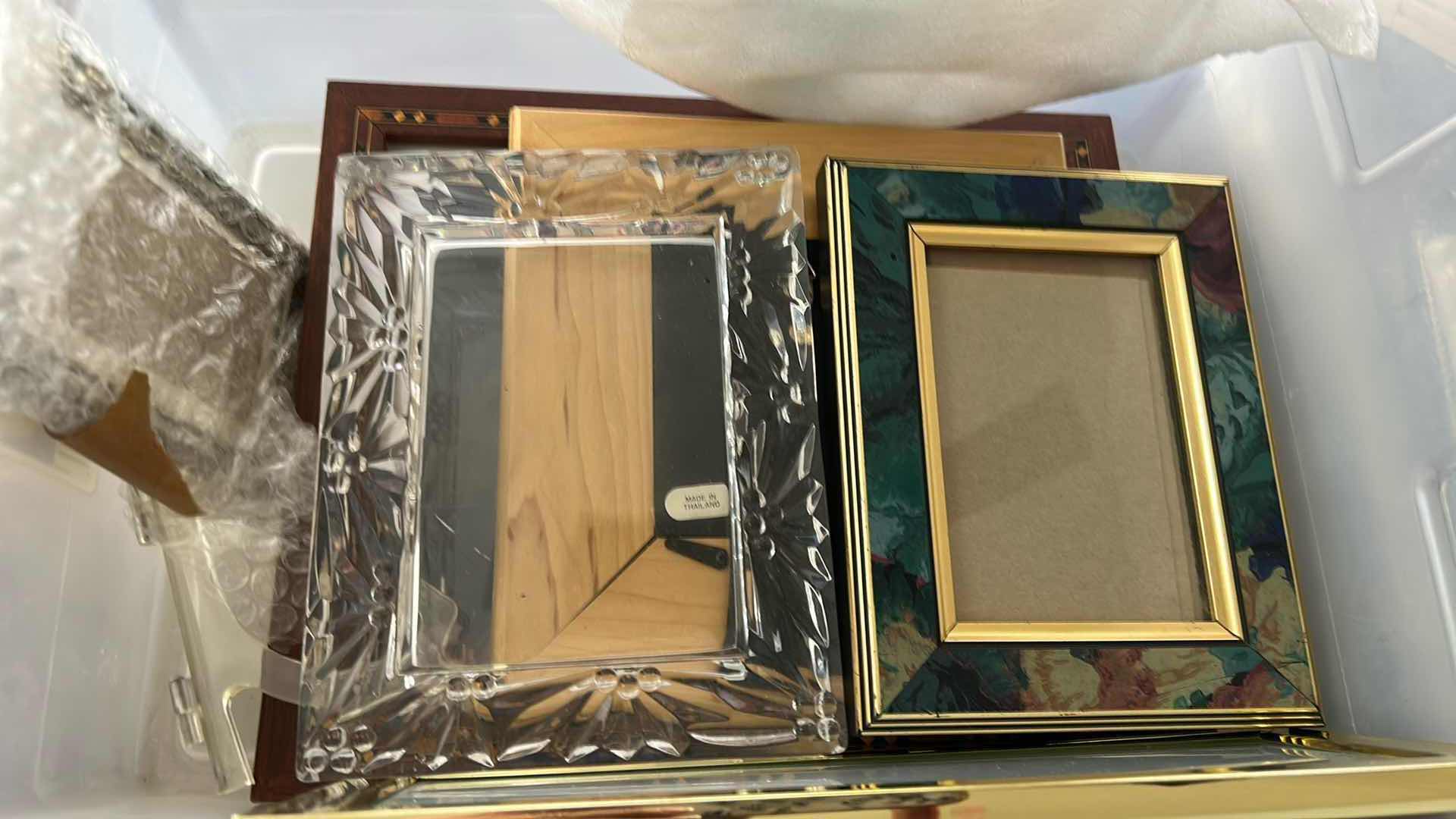 Photo 1 of CONTENTS OF PLASTIC CONTAINER ASSORTED PICTURE FRAMES