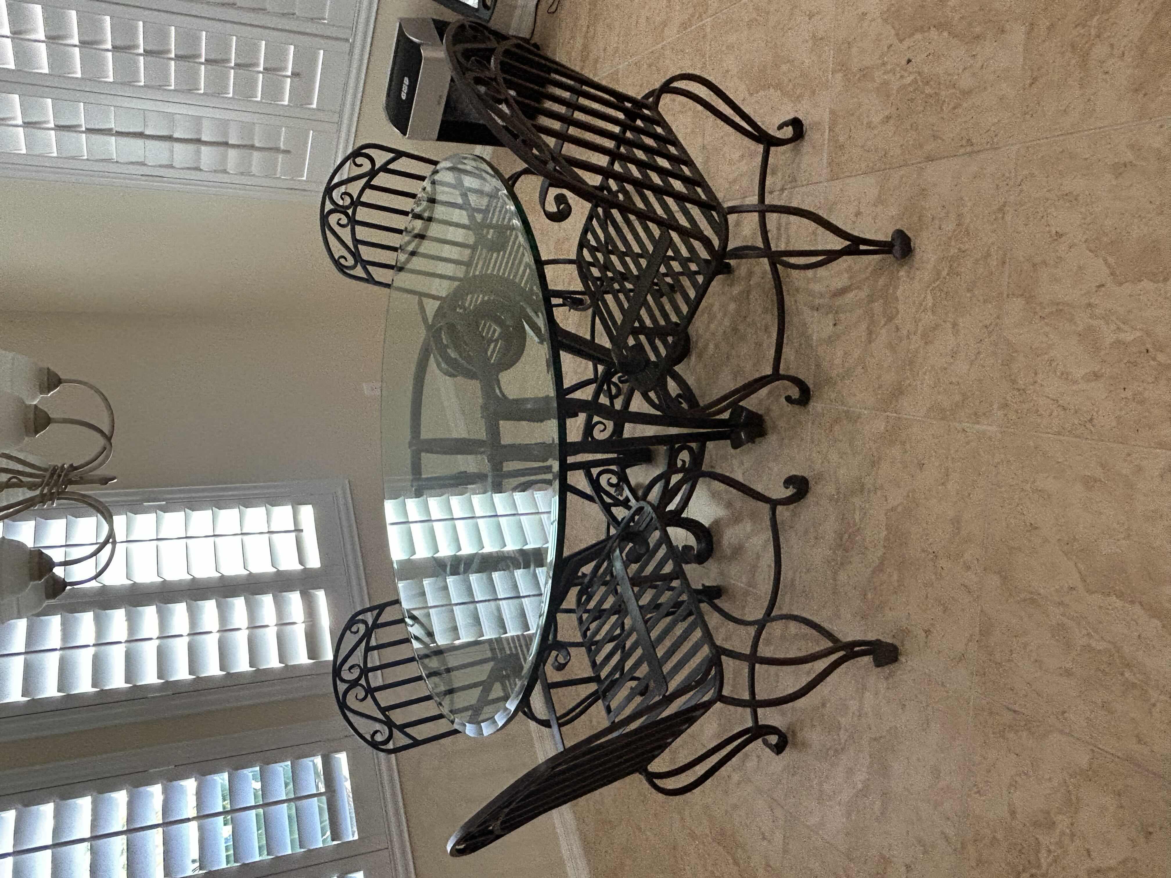 Photo 1 of REGENCY STYLE ROUND WROUGHT IRON BASE DINING TABLE W BEVELED GLASS TOP W 54" CHAIRS SOLD SEPARATELY