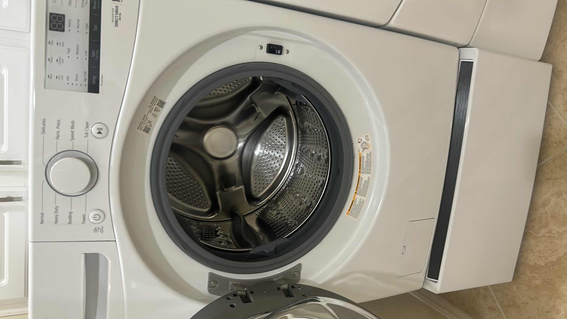 Photo 1 of LG 5.5 CU FT WHITE FRONT LOAD WASHER MODEL WM3400CW W PEDESTAL H 53" W 27"