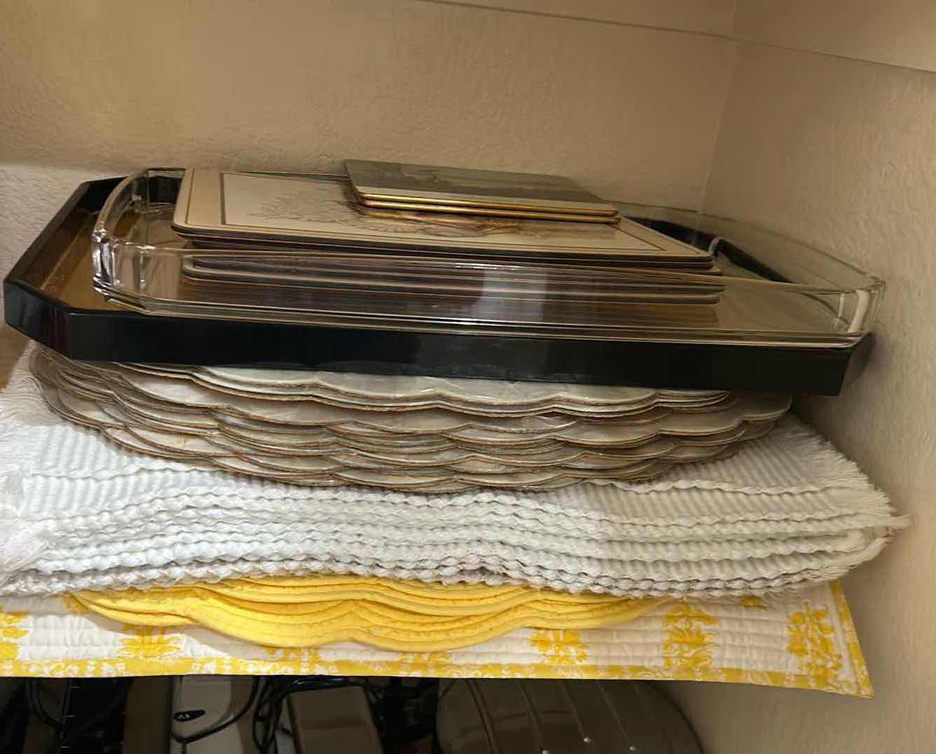 Photo 1 of CONTENTS OF SHELF PLACEMATS